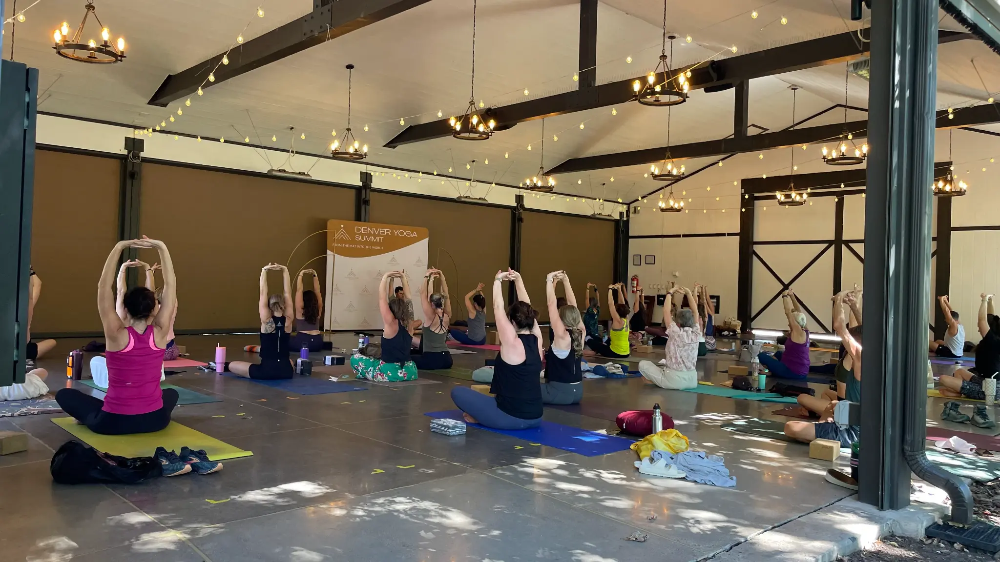 Denver Yoga Summit attendees practicing together
